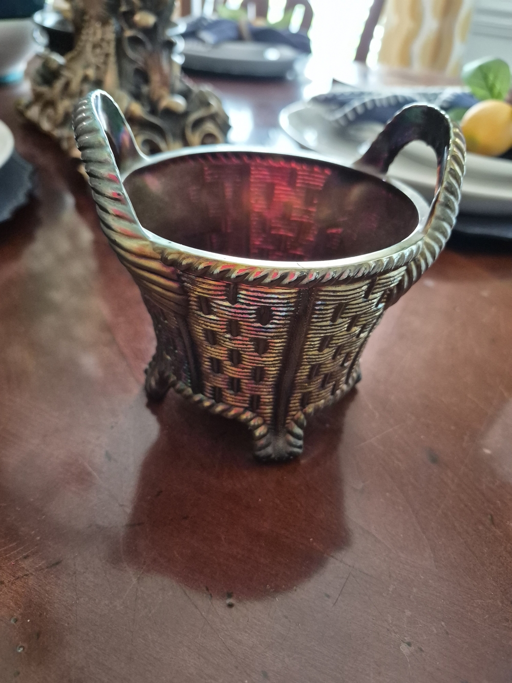 Vintage Amber carnival glass basket with handles.